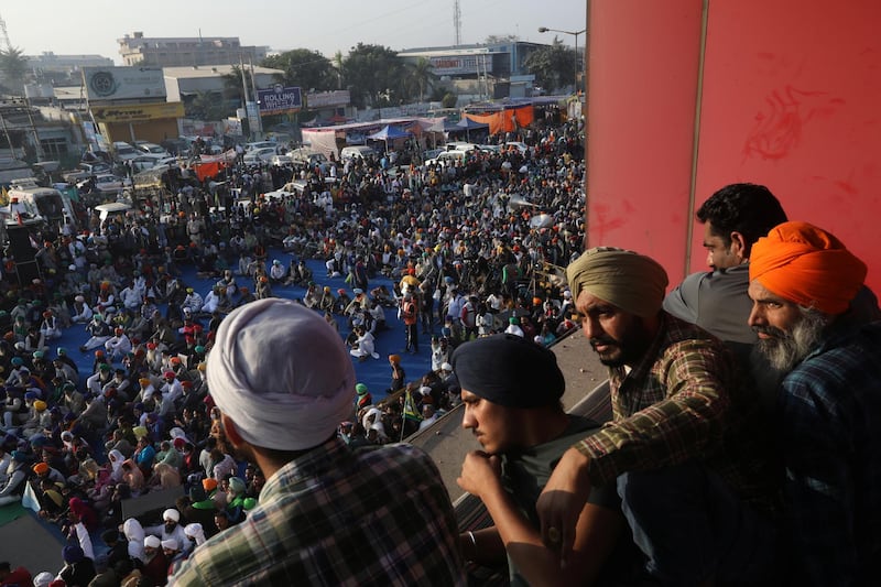 Farmers attend a protest during a nationwide strike against the newly passed farm bills at Singhu border near Delhi, India. Reuters