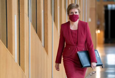 First Minister Nicola Sturgeon arrives at the main chamber of the Scottish Parliament, in Edinburgh. Getty Images