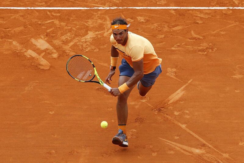 Spain's Rafael Nadal returns the ball to France's Gael Monfils during the final tennis match at the Monte-Carlo ATP Masters Series Tournament in Monaco on April 17, 2016.   AFP PHOTO / VALERY HACHE (Photo by VALERY HACHE / AFP)