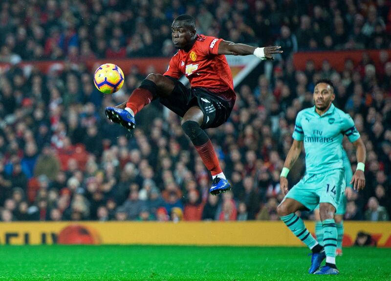 Arsenal's Pierre-Emerick Aubameyang, right, in action with Manchester United's Eric Bailly. EPA