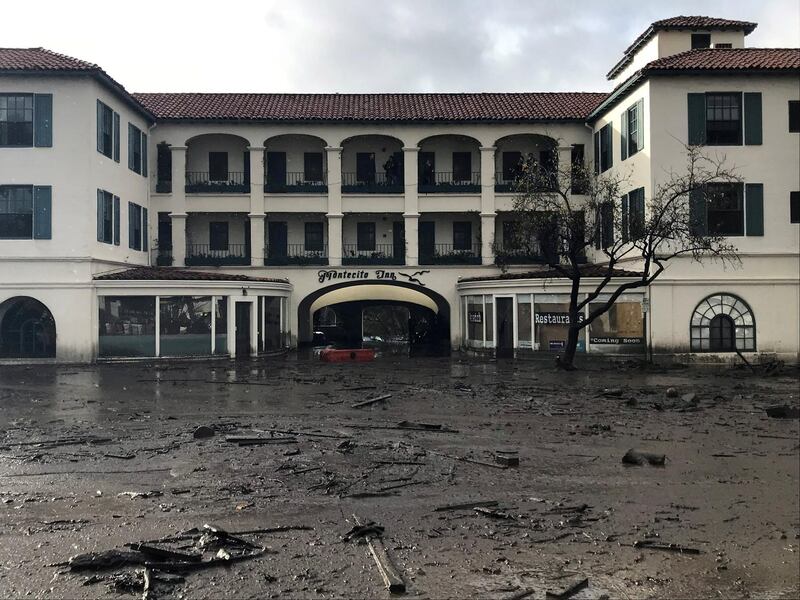 The Montecito Inn sits in flooded waters and debris after a mudslide in Montecito, California. Kenneth Song / Santa Barbara News-Press via Reuters