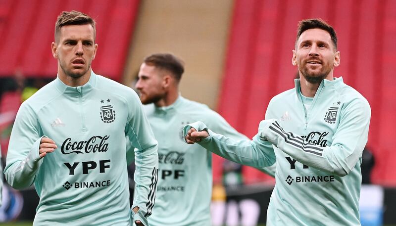 Argentina national team captain Lionel Messi, right, and teammate Giovani Lo Celso. EPA 