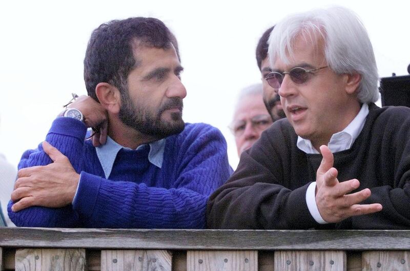Sheikh Mohammed al Maktoum (L) of Dubai talks with trainer Bob Baffert, winner of the last two Kentucky Derby's 29 April 1999 at Churchill Downs in Louisville, KY. The 125th running of the Kentucky Derby will be held on 01 May 1999.  (ELECTRONIC IMAGE)    AFP PHOTO/Jeff HAYNES (Photo by JEFF HAYNES / AFP)