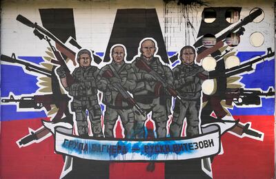 A mural depicting mercenaries of Russia's Wagner Group that reads: 'Wagner Group - Russian knights' in Belgrade, Serbia. AP