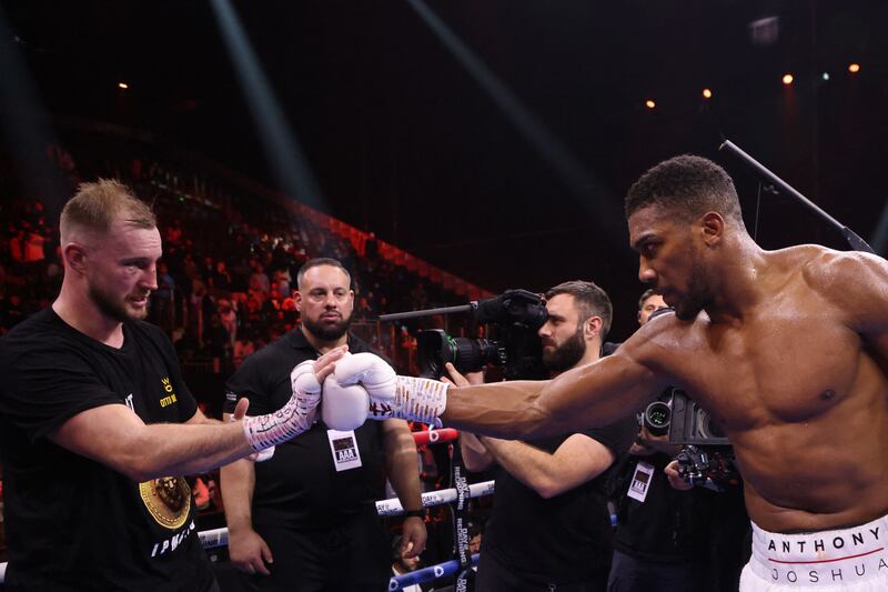 Britain's Anthony Joshua greets Sweden's Otto Wallin after his win at the Kingdom Arena in Riyadh. AFP