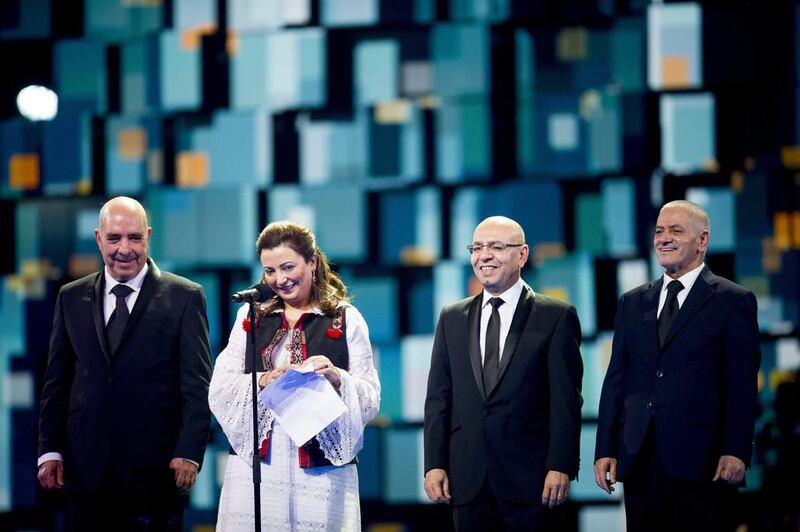 Nobel Peace Prize laureates of the Tunisian National Dialogue Quartet are honoured on the stage during the annual Nobel Peace Prize concert in Telenor Arena outside Oslo. Jon Olav Nesvold / EPA





J