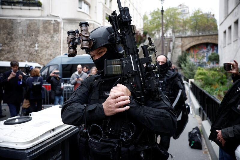 The man was reportedly seen outside the consulate building with a grenade and wearing a vest of explosives. Reuters