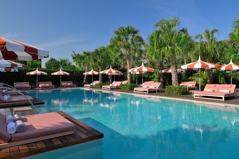 Comfortable loungers line the resort's two swimming pools