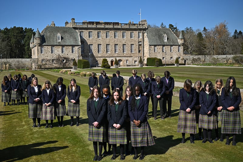 Pupils and staff from Gordonstoun school observe a three-minute silence in memory of former pupil Prince Phillip, the Duke of Edinburgh, on April 17, 2021