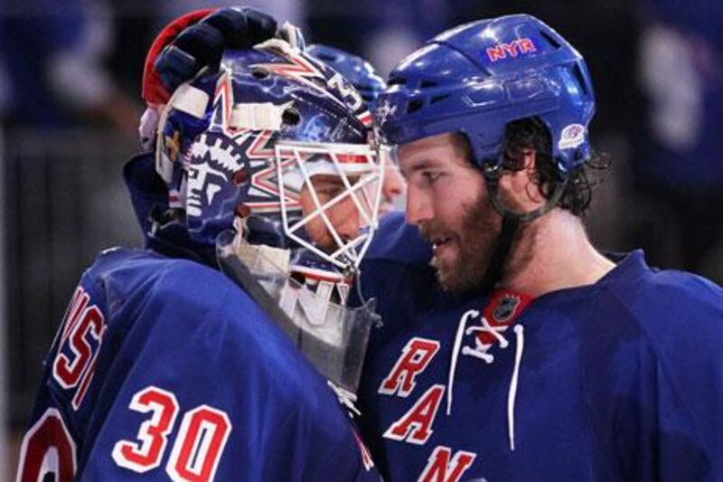 Henrik Lundqvist, left, credited hard work for their success in the NHL so far this season.