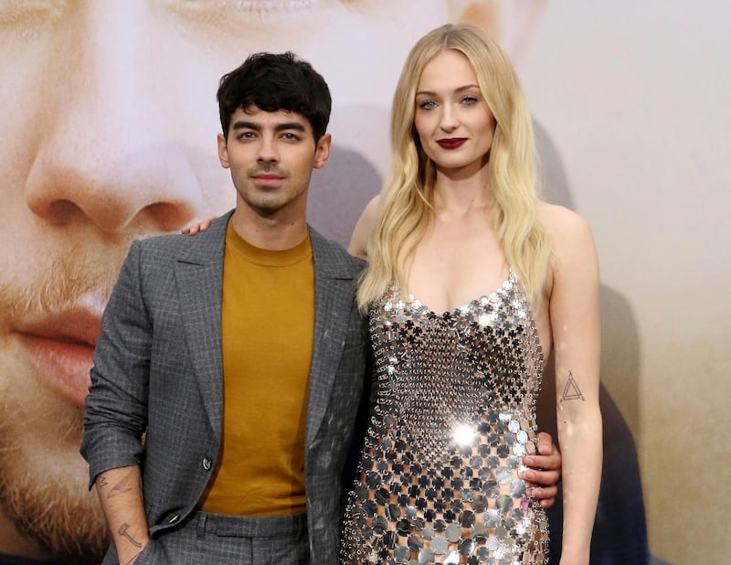 FILE - Joe Jonas, left, and Sophie Turner attend the World Premiere of "Chasing Happiness," in Los Angeles on June 3, 2019. Turner and Joe Jonas have had their first child. The 24-year-old â€œGame of Thronesâ€ star Turner and the 30-year-old singer Jonas announced the birth Monday. In a joint statement released by his label Republic Records, the two said only that they are "delighted to announce the birth of their baby.â€ They gave no further details on the child. (Photo by Willy Sanjuan/Invision/AP, File)