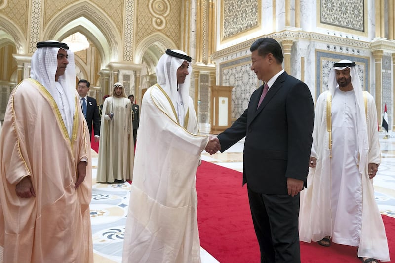 ABU DHABI, UNITED ARAB EMIRATES - July 20, 2018:   HE Xi Jinping, President of China (R) greets HH Sheikh Hazza bin Zayed Al Nahyan, Vice Chairman of the Abu Dhabi Executive Council (2nd L) at the Presidential Palace. 

( Mohamed Al Hammadi / Crown Prince Court - Abu Dhabi )
---