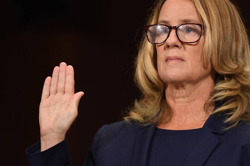 epa07051285 Christine Blasey Ford is sworn in before testifying during the Senate Judiciary Committee hearing on the nomination of Brett Kavanaugh to be an associate justice of the Supreme Court of the United States, on Capitol Hill in Washington, DC, USA, 27 September 2018. US President Donald J. Trump's nominee to be a US Supreme Court associate justice Brett Kavanaugh is in a tumultuous confirmation process as multiple women have accused Kavanaugh of sexual misconduct.  EPA/SAUL LOEB / POOL