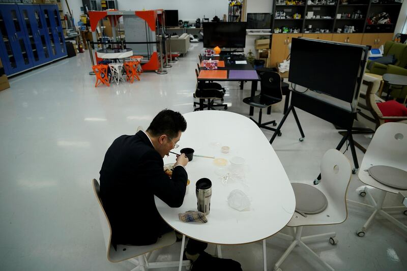 A professor of Pusan National University Park Hyun eats lunch while keeping social distancing in South Korea. Reuters