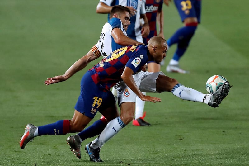 Barcelona's Martin Braithwaite in action against Espanyol's David Lopez. EPA