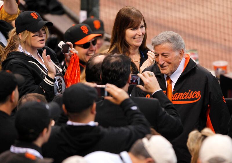 Tony Bennett with fans before Game 1 of Major League Baseball's World Series between the San Francisco Giants and the Texas Rangers in San Francisco, October 2010. Reuters