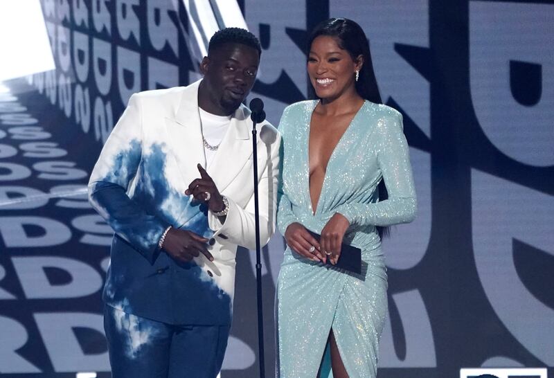 Daniel Kaluuya and Keke Palmer present the award for Best Male R&B/Pop Artist. AP