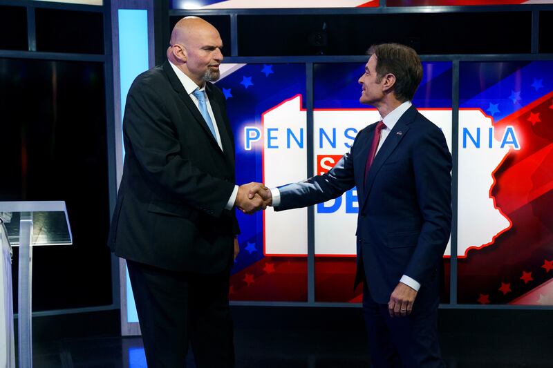 US Senate hopeful John Fetterman stumbled over his words during his debate against Republican rival Mehmet Oz, showing the lingering effects of a stroke he suffered months ago. EPA