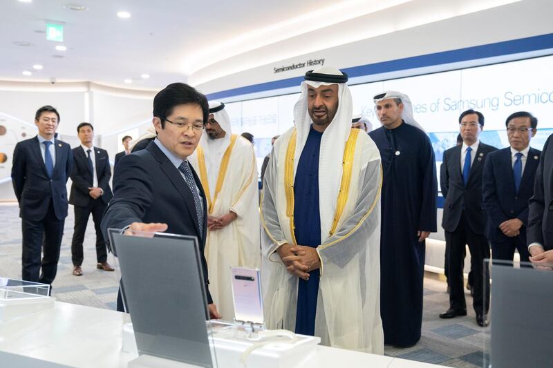 HWASEONG CITY, REPUBLIC OF KOREA (SOUTH KOREA) - February 26, 2019: HH Sheikh Mohamed bin Zayed Al Nahyan, Crown Prince of Abu Dhabi and Deputy Supreme Commander of the UAE Armed Forces (front R) tours the Samsung Electronics Semiconductor Research and Development Centre. Seen with HE Khaldoon Khalifa Al Mubarak, CEO and Managing Director Mubadala, Chairman of the Abu Dhabi Executive Affairs Authority and Abu Dhabi Executive Council Member (back 3rd R).

( Mohamed Al Hammadi / Ministry of Presidential Affairs )
---