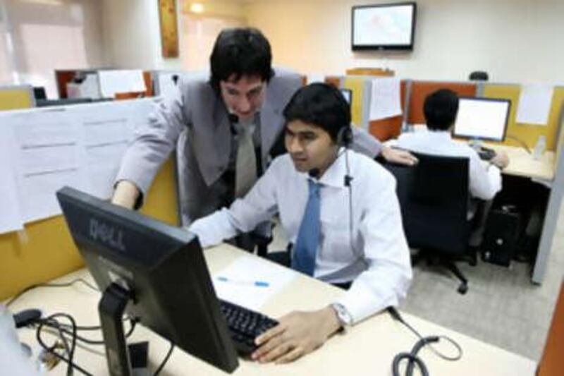 Abu Dhabi - 4th November  ,  2008 -Staff working  at the Trans Ad call centre   ( Andrew Parsons  /  The National )