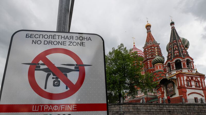 A 'No Drone Zone' sign in Moscow's Red Square. Russia has banned unauthorised drone flights over the city after the Kremlin said it came under attack from Ukrainian unmanned aerial vehicles. EPA