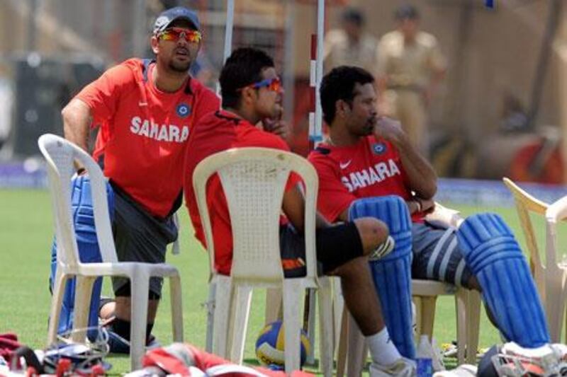 Yuvraj Singh, left, and Sachin Tendulkar, right, know what it is like to be adulated one moment and vilified another. Along with Zaheer Khan, not pictured, they hope to be heroes for India once again.