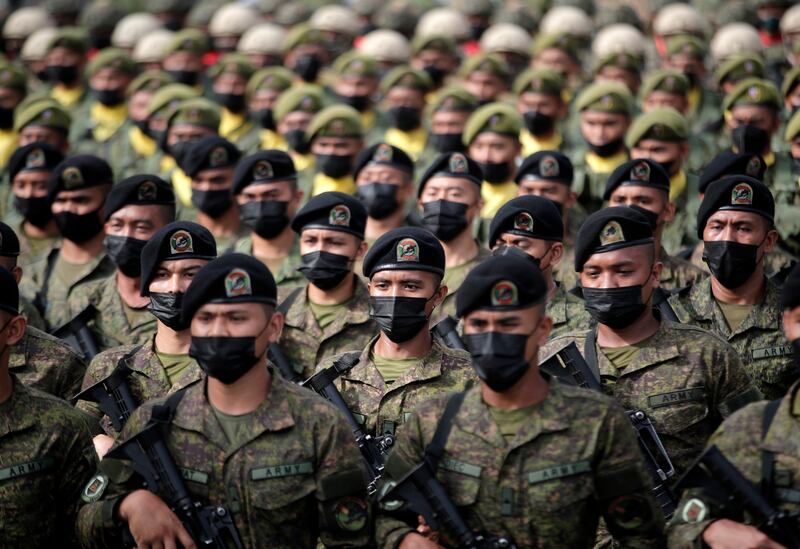 Soldiers rehearse for the inauguration parade of the Philippines president-elect Ferdinand 'Bongbong' Marcos Jr in Manila on June 30. EPA