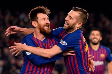 Jordi Alba, right, has set up seven of Lionel Messi's goals in La Liga this season. AFP