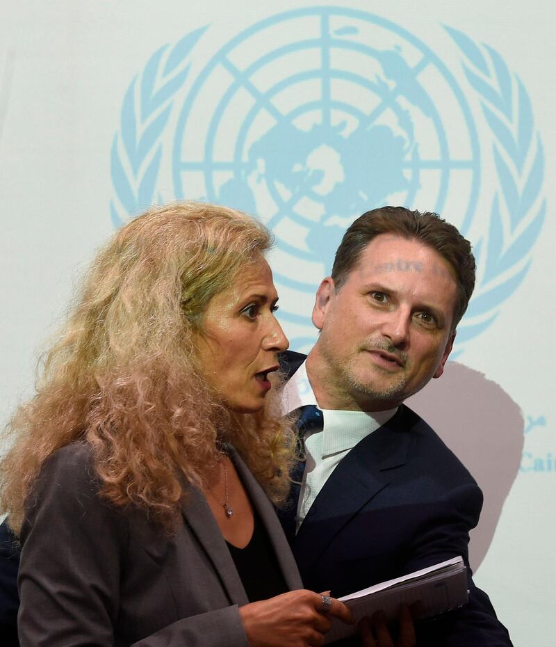 Commissioner General for the United Nations Relief and Works Agency for Palestine Refugees (UNRWA) Pierre Krahenbuhl, right, looks on behind the head of UN information, Radhia Achouri, centre, during a press conference at the United Nations Information centre in Cairo.  AFP