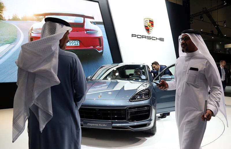 Dubai, 14, Nov, 2017:  Visitors check the new Porsche Cars displayed at the Dubai International Motor Show in Dubai. Satish Kumar for the National / Story by Adam Workman