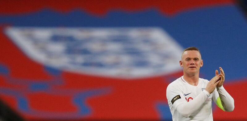 England's Wayne Rooney applauds their fans after the match.  REUTERS