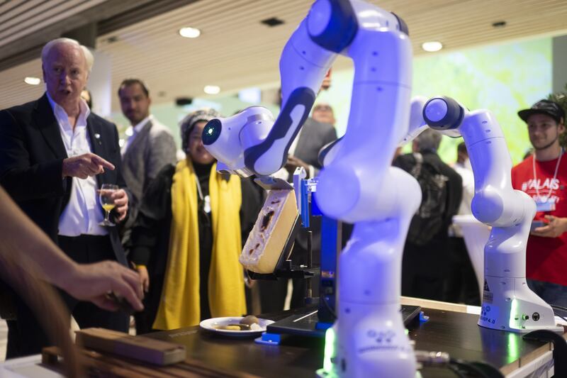 A robot on display in Davos. WEF delegates have gathered in person for the first time in two years. EPA