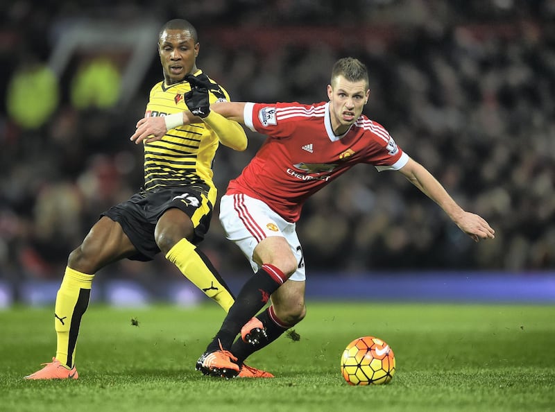 MANCHESTER, ENGLAND - MARCH 02:  Odion Ighalo of Watford challenges Morgan Schneiderlin of Manchester United during the Barclays Premier League match between Manchester United and Watford at Old Trafford on March 2, 2016 in Manchester, England.  (Photo by Laurence Griffiths/Getty Images)