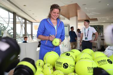 Kim Clijsters signs autographs ahead of the Dubai Duty Free Tennis Championships. Getty