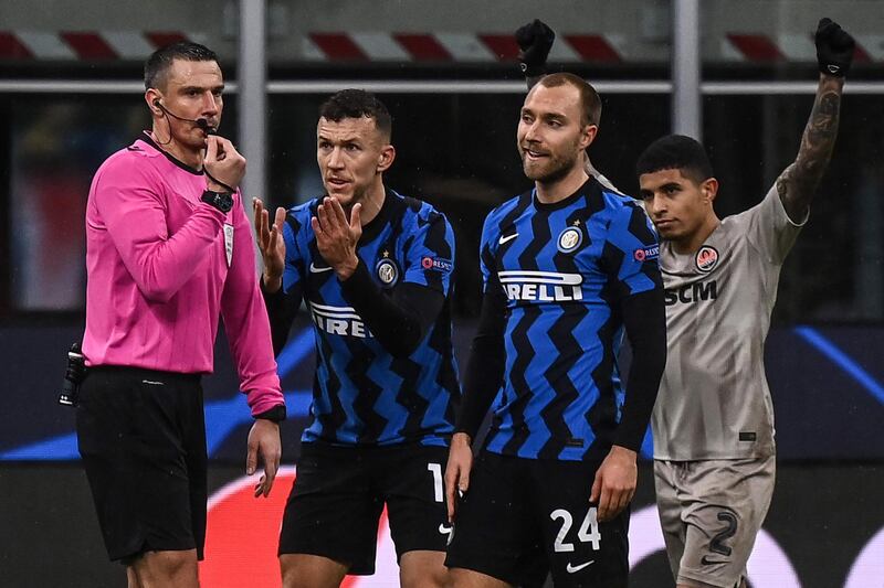 Referee Slavko Vincic blows the final whistle at the end of Inter Milan's Champions League draw with Shakhtar Donetsk, a result that meant the Italian side were out of the competition. AFP