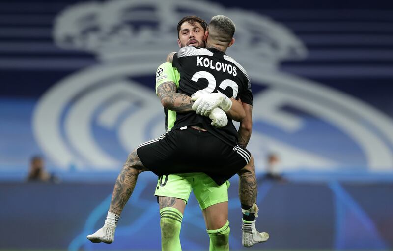 Giorgos Athanasiadis of Sheriff Tiraspol celebrates with teammate Dimitris Kolovos after the victory at Santiago Bernabeu. Getty