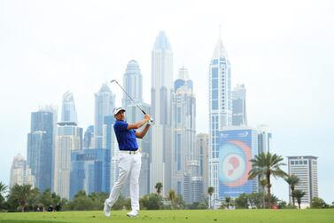 DUBAI, UNITED ARAB EMIRATES - JANUARY 24: Ian Poulter of England plays his second shot on the thirteenth hole during Day Two of the Omega Dubai Desert Classic at Emirates Golf Club on January 24, 2020 in Dubai, United Arab Emirates. (Photo by Andrew Redington/Getty Images)