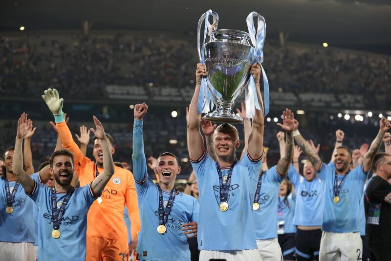Erling Haaland of Manchester City celebrates with the UEFA Champions League trophy after the team's victory during the UEFA Champions League 2022/23 final match between FC Internazionale and Manchester City FC at Atatuerk Olympic Stadium in Istanbul, Turkey. Getty Images