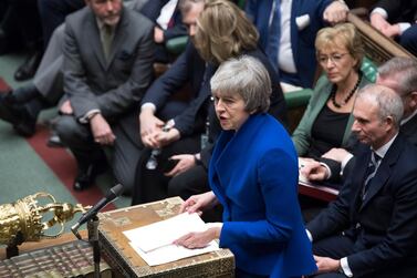 Britain's Prime Minister Theresa May speaks to parliament after she won a no-confidence vote against her government, in the House of Commons, London, Wednesday Jan. 16, 2019. AP