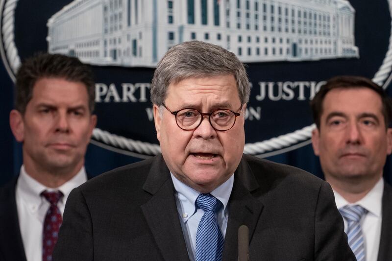 Attorney General William Barr, joined by FBI Deputy Director David Bowdich, left, and other officials, speaks to reporters at the Justice Department in Washington, Monday, Jan. 13, 2020, to announce results of an investigation of the shootings at the Pensacola Naval Air Station in Florida. On Dec. 6, 2019, 21-year-old Saudi Air Force officer, 2nd Lt. Mohammed Alshamrani, opened fire at the naval base in Pensacola, killing three U.S. sailors and injuring eight other people. (AP Photo/J. Scott Applewhite)