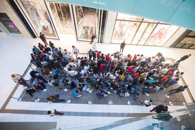 DUBAI, UNITED ARAB EMIRATES, 21 SEPTEMBER 2018 - Crowd at Iphone XS launch at Apple store Dubai Mall.  Leslie Pableo for The National