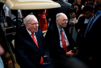 Warren Buffett (L), CEO of Berkshire Hathaway, and vice chairman Charlie Munger attend the 2019 annual shareholders meeting in Omaha, Nebraska, May 3, 2019.   / AFP / Johannes EISELE
