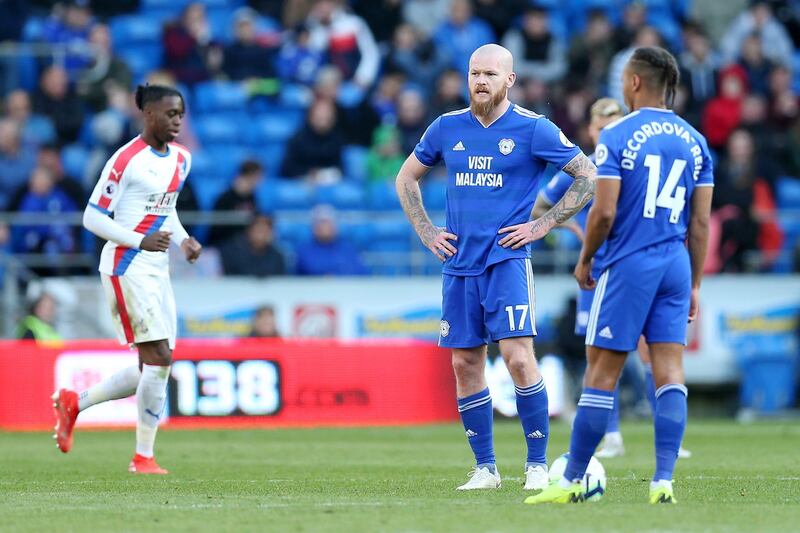 CARDIFF, WALES - MAY 04: Aron Gunnarsson and Bobby Reid of Cardiff City look dejected after conceding during the Premier League match between Cardiff City and Crystal Palace at Cardiff City Stadium on May 04, 2019 in Cardiff, United Kingdom. (Photo by Alex Morton/Getty Images)
