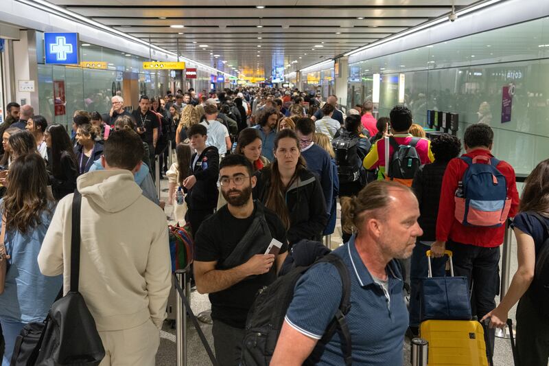 A queue snakes through the airport. Getty Images