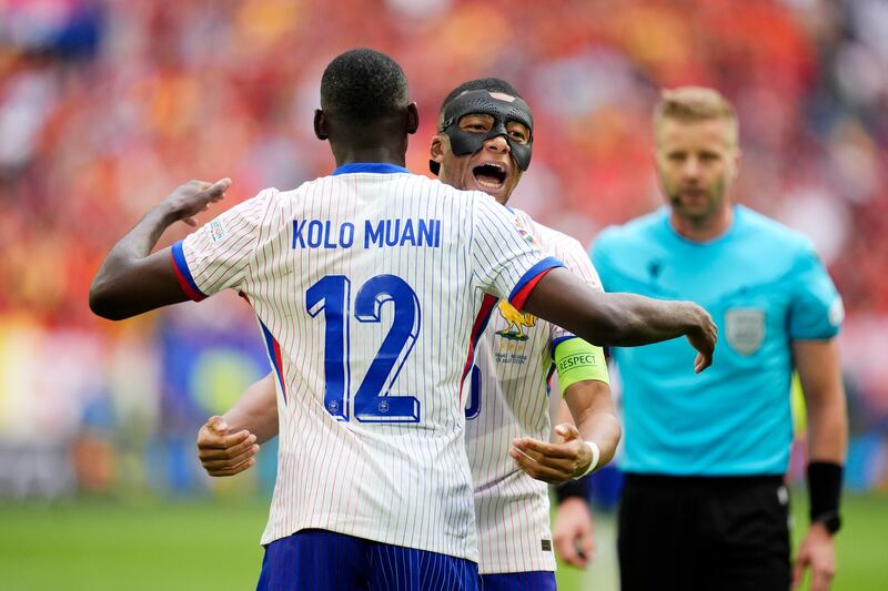 France's Kylian Mbappe and Randal Kolo Muani celebrate the winning goal. PA 