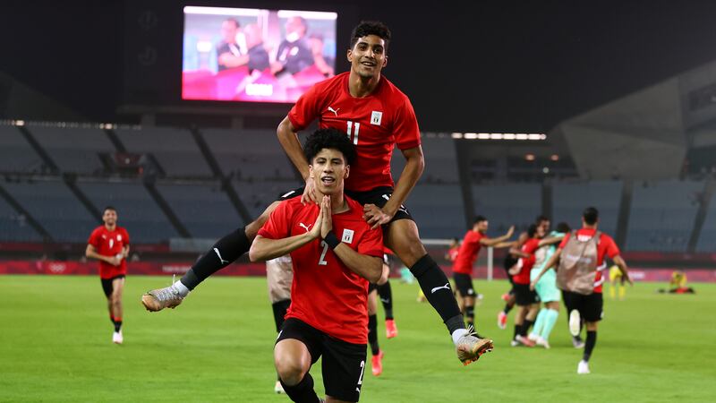 Ammar Hamdy of Egypt celebrates scoring their second goal with Ibrahim Adel.