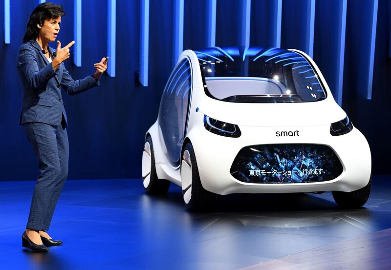 The head of Smart, Annette Winkler, introduces the Smart vision EQ fortwo at the Mercedes presentation during the Tokyo Motor Show. Toshifumi Kitamura/ AFP
