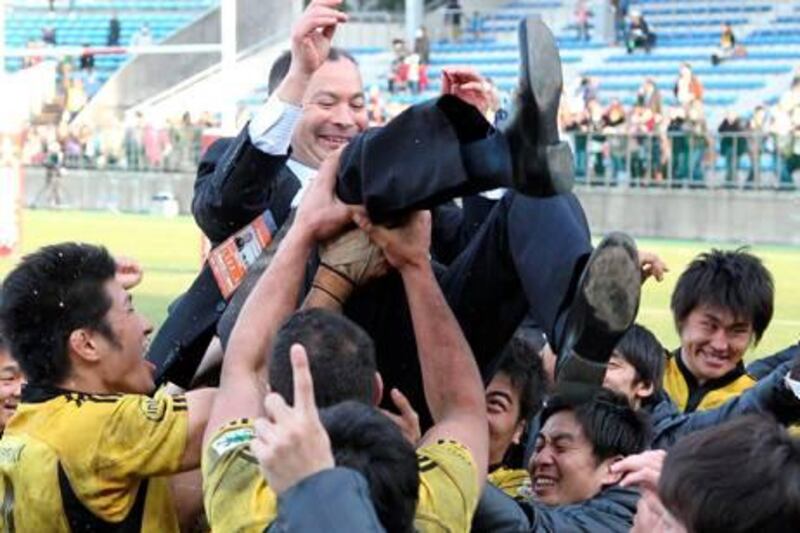 TOKYO, JAPAN - FEBRUARY 27:  (JAPANESE NEWSPAPERS OUT) Head coach Eddie Jones of Suntory Sungoriath is thrown into the air after winning the 48th All-Japan Rugby Championship Final match between Suntory Sungoriath and Sanyo Wild Knights at Prince Chichibu Stadium on February 27, 2011 in Tokyo, Japan.  (Photo by Sankei via Getty Images)