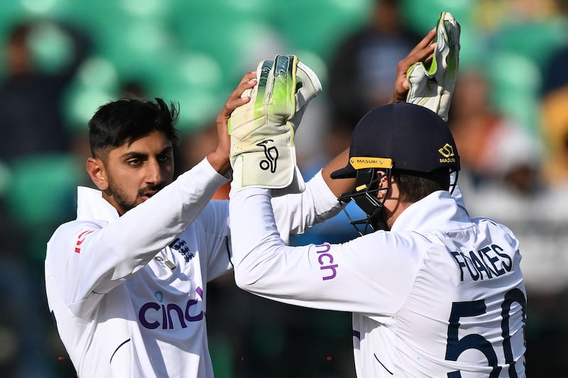 England spinner Shoaib Bashir celebrates with Ben Foakes after the stumping of India's Yashasvi Jaiswal. AFP