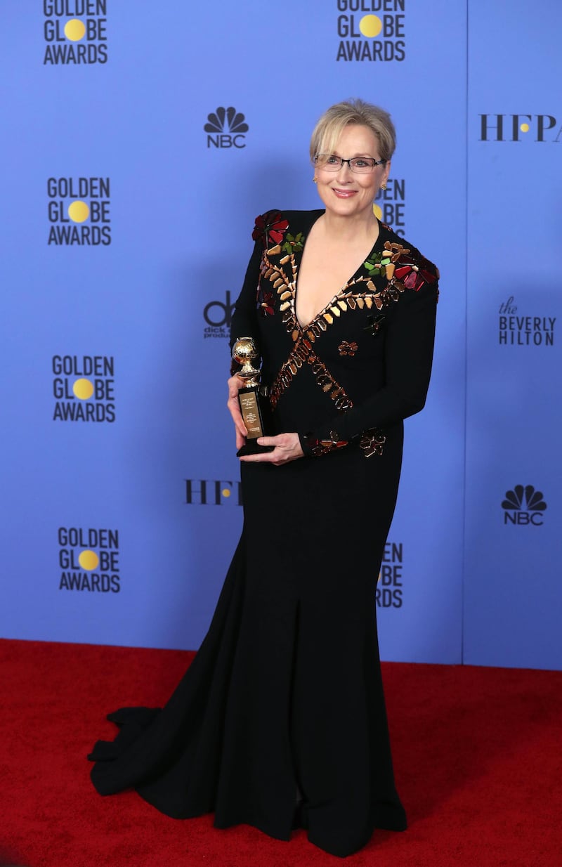epa05706321 Meryl Streep holds her Cecil B. DeMille Lifetime Achievement Award in the press room during the 74th annual Golden Globe Awards ceremony at the Beverly Hilton Hotel in Beverly Hills, California, USA, 08 January 2017.  EPA/MIKE NELSON